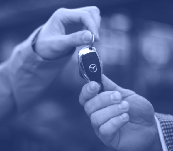 A Citrin valet handing keys to a customer